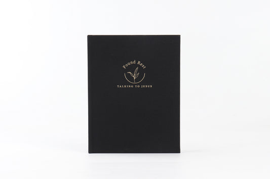 A black journal with the title 'Found Rest' printed in gold lettering on the cover.